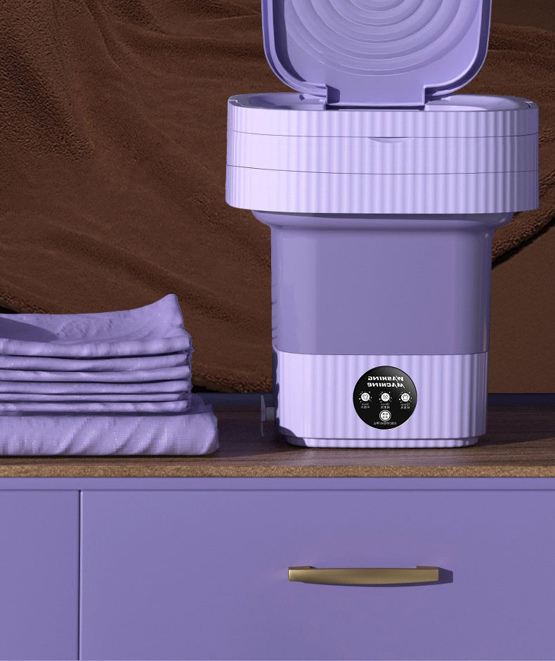 Paarse opvouwbare mini wasmachine