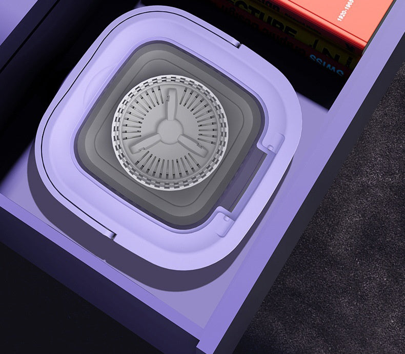 Paarse opvouwbare mini wasmachine
